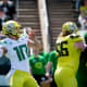 Yellow Team quarterback Bo Nix (10) throws out a pass during the Oregon Spring Game Saturday, April 23, 2022, at Autzen Stadium.